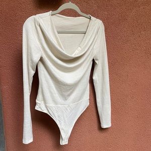 Banana Republic cream colored thong body suit.